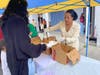 Lutheran Social Services CEO Dr. LaSharnda Beckwith Serves Lunch to Families