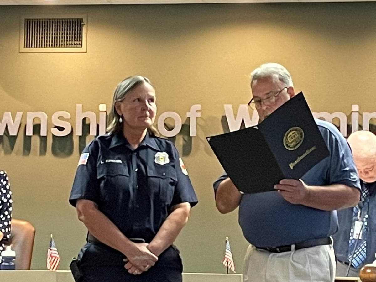 Hartsville Fire Co. volunteer Lynn Kirkner, left, was given a proclamation by Warminster Township Supervisors Chairman Kenneth Hayes.