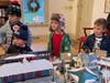 These children view the train model layout.