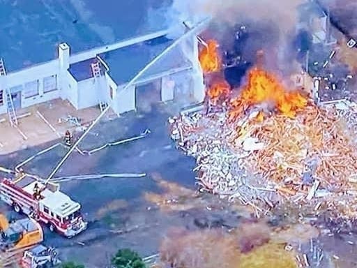 Bensalem Township fire crews battled a blaze Wednesday that closed Street Road in both directions.