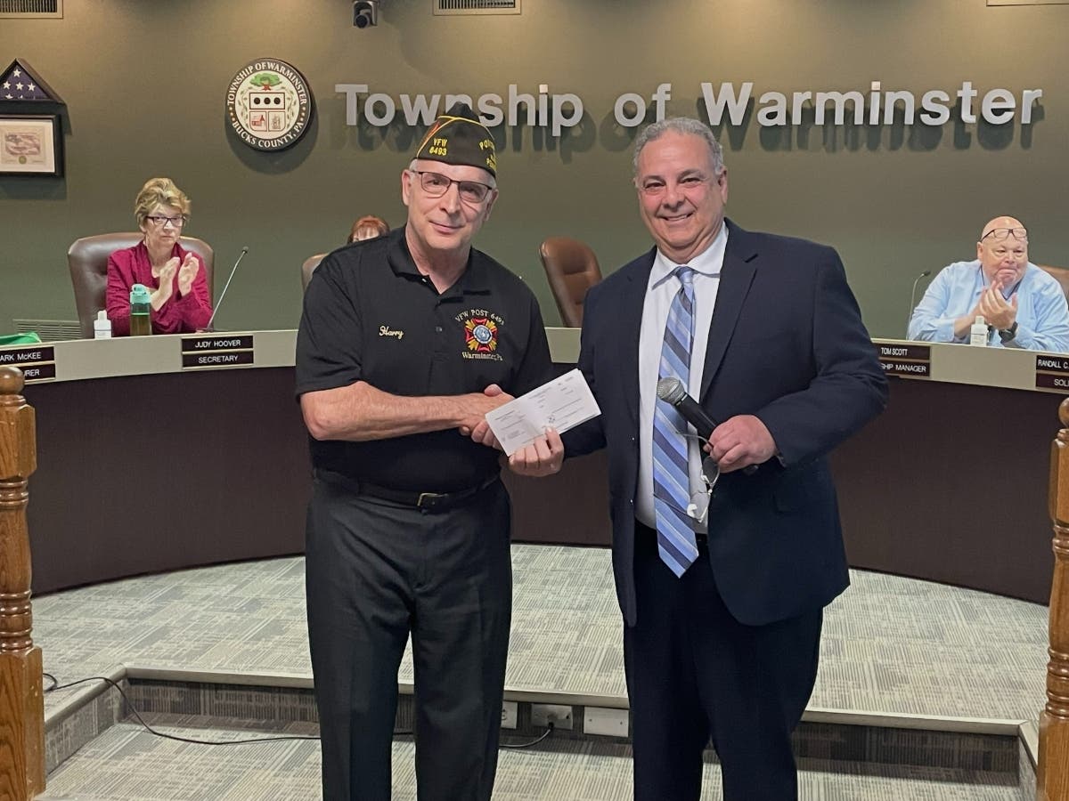 VFW Post 6493 Commander Harry DeLorenzo accepts a $10,000 check from Warminster Township Supervisors Chairman Kenneth Hayes at the supervisors' meeting earlier this month.