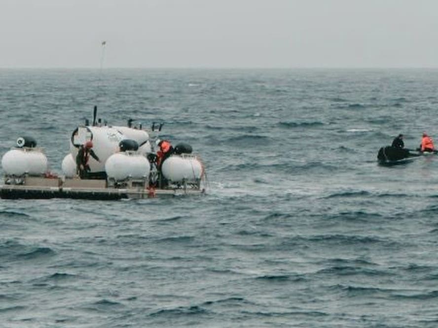 In this photo released by Action Aviation, the submersible Titan is prepared for a dive into a remote area of the Atlantic Ocean on an expedition to the Titanic on Sunday. Rescuers are racing against time to find the missing submersible.