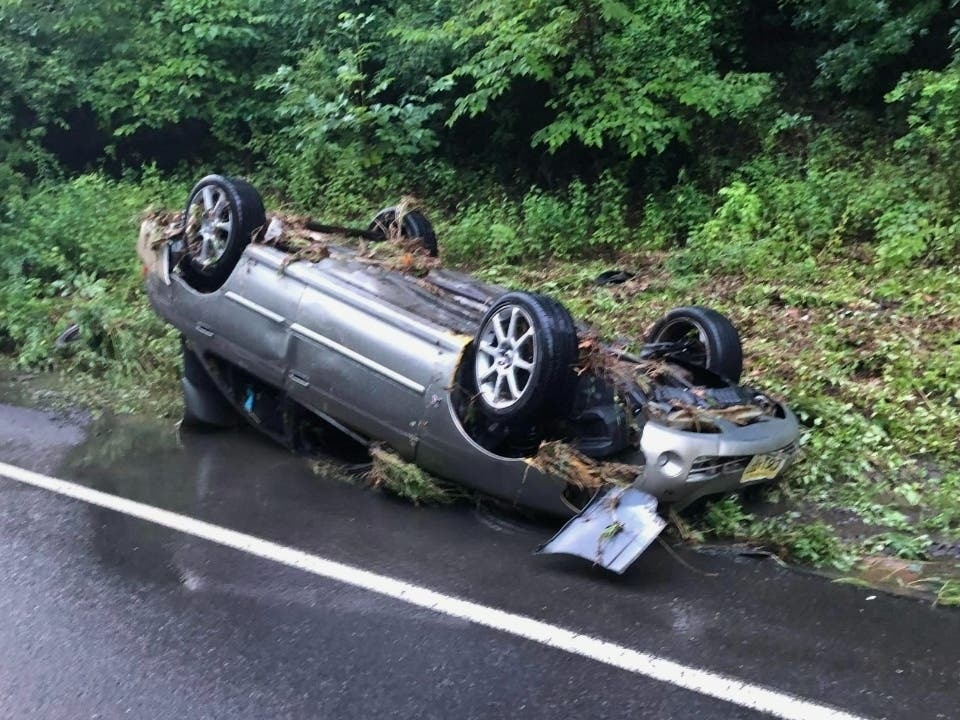 A vehicle was flipped over by flash flooding in Upper Makefield Township from a fast-moving storm Saturday afternoon.