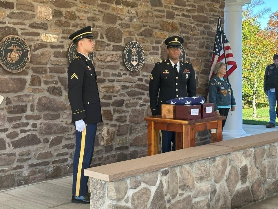 The American flag is folded during a 2019 Unattended Veterans Service at Washington Crossing National Cemetery.