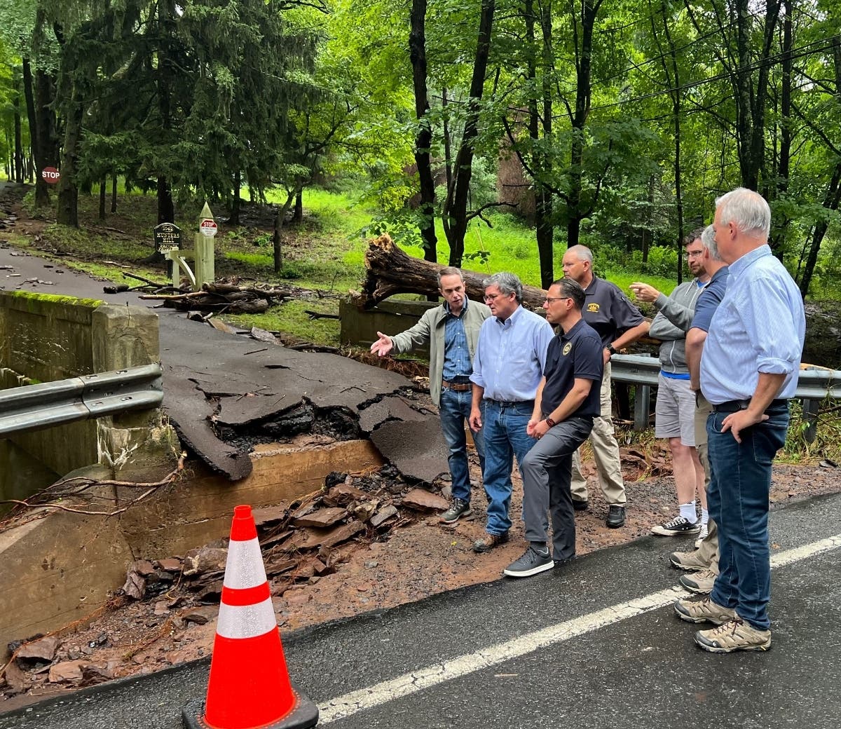 State Sen. Steve Santarsiero and other local officials showed Gov. Josh Shapiro roads damaged by the mid-July flash flooding in Upper and Lower Makefield townships. 