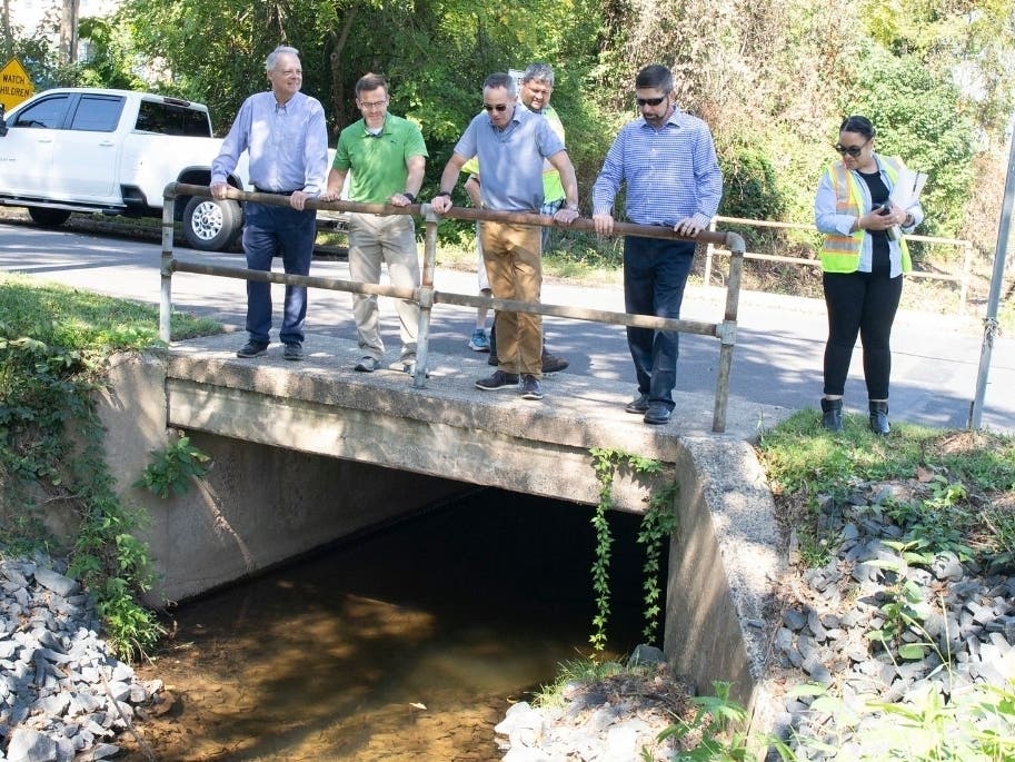 (Left to Right) State Rep. Warren, Lower Makefield Township Supervisor Dan Grenier, Senator Santarsiero and PennDOT officials tour a road damaged by flash flooding in mid-July.