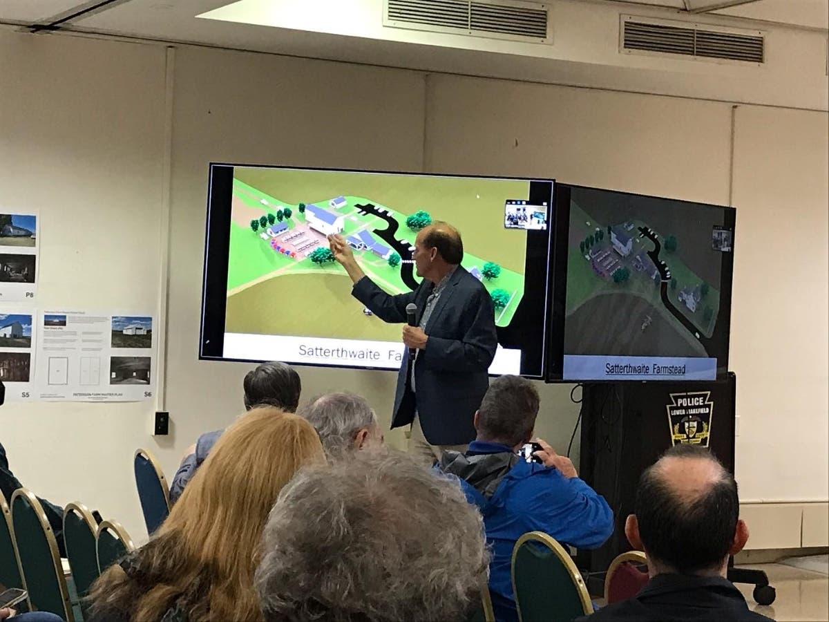 Douglas Seiler of the Seiler + Drury architecture firm presents plans for Patterson Farm's future at a recent community forum in Lower Makefield Township.