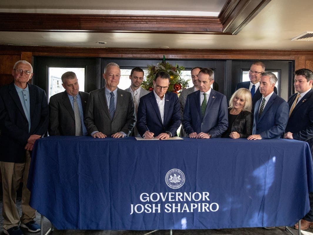 Gov. Shapiro joined legislators in Yardley Monday morning to sign a bill creating a state task force to examine the costs of flood insurance premiums.