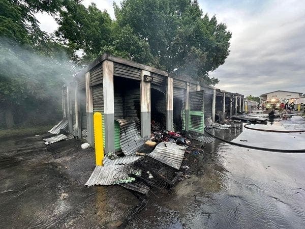 A fire that destroyed 20 storage units on Lincoln Highway in Falls Township early Sunday morning is under investigation, authorities said.