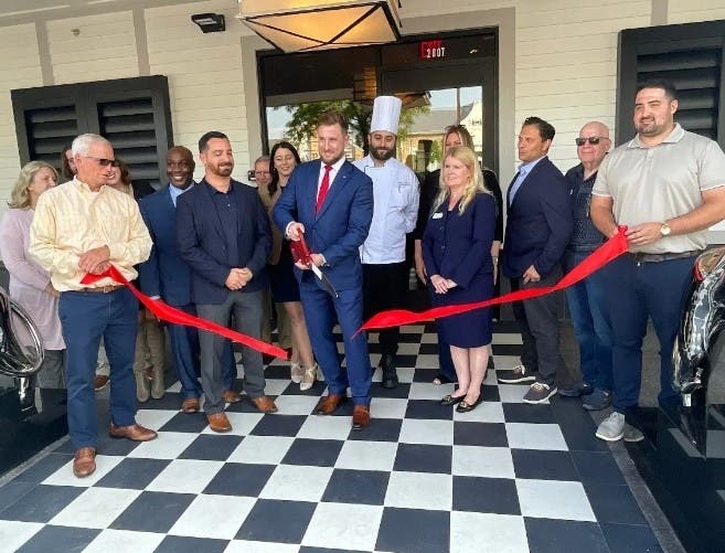 The Capital Grille officially opened on Monday at the Village at Newtown Shopping Center.