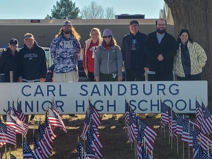 Over 300 flags were planted in front of the Carl Sandburg Middle School​ in honor of Veterans Day on Monday.