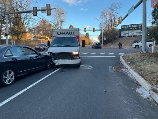 A Bristol Township man is in custody after leading police in a pursuit in a stolen U-Haul in which he struck two police cars and other vehicles on Tuesday.