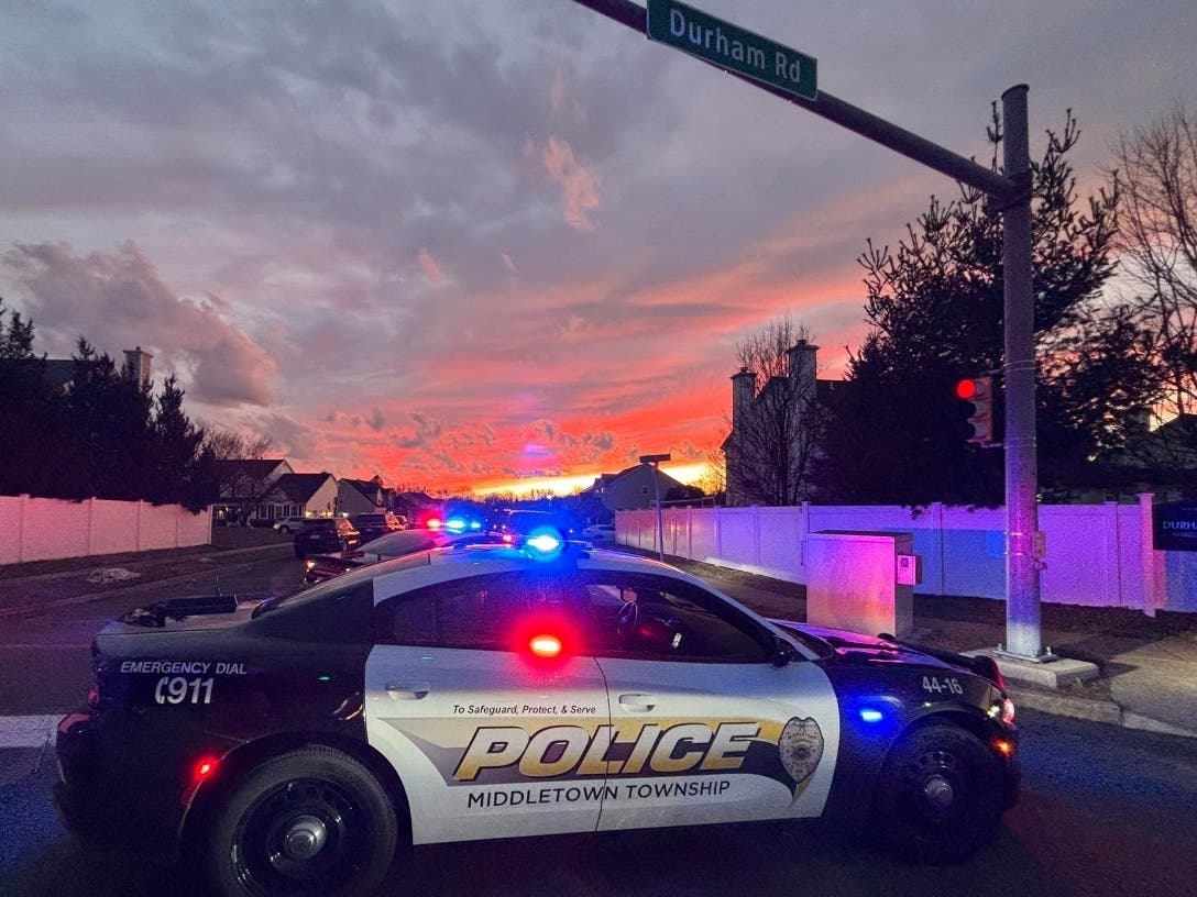 A Middletown Township Police Department blocks off Durham Road during an FBI raid at a home there on Sunday night.