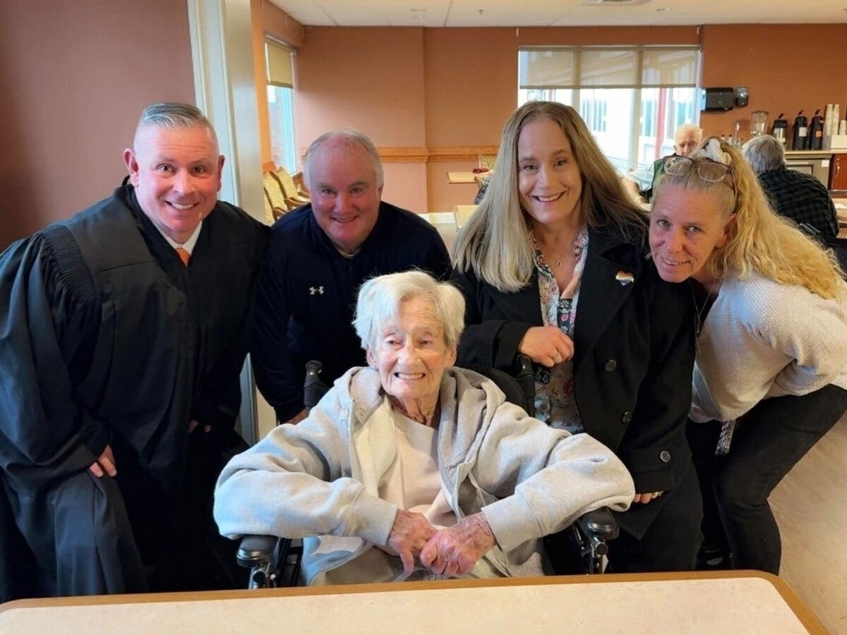 Jane Lynch poses after being sworn in to a new term on the Centennial School Board. Lynch was sworn in shortly before she passed away.