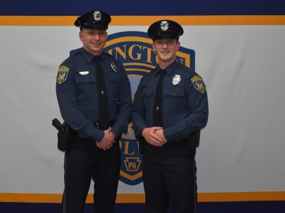 Two new police officers were sworn in at last week's Abington Township Board of Commissioners meeting.