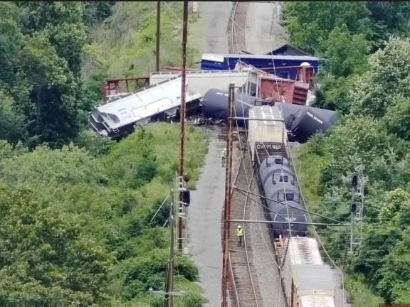 Bensalem Police said 13 of 72 rail cars derailed on Tuesday afternoon, including three that contained hazardous materials.