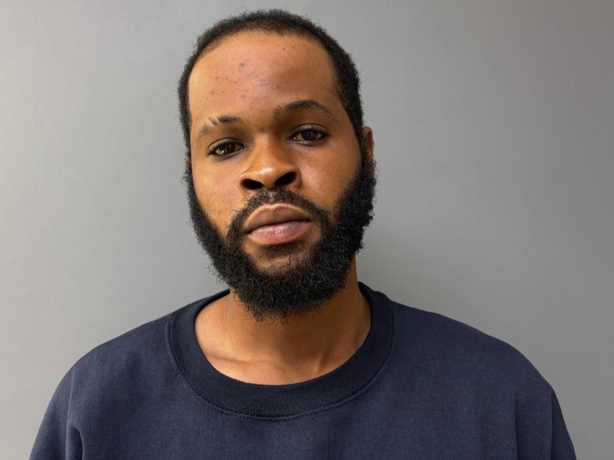 A criminal complaint states that Latosha Ann Cooper married Destino Jean Louis for immigration purposes. He has been charged in Cooper's fatal shooting.