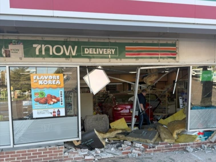Bensalem Police said a stolen vehicle crashed into the Street Road 7-Eleven store on Thursday afternoon, causing it to catch fire.