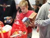 On Saturday, hundreds of volunteers collected and sorted food for twenty-one area middle and high schools.  Jack volunteered at the Herndon Middle School  location.