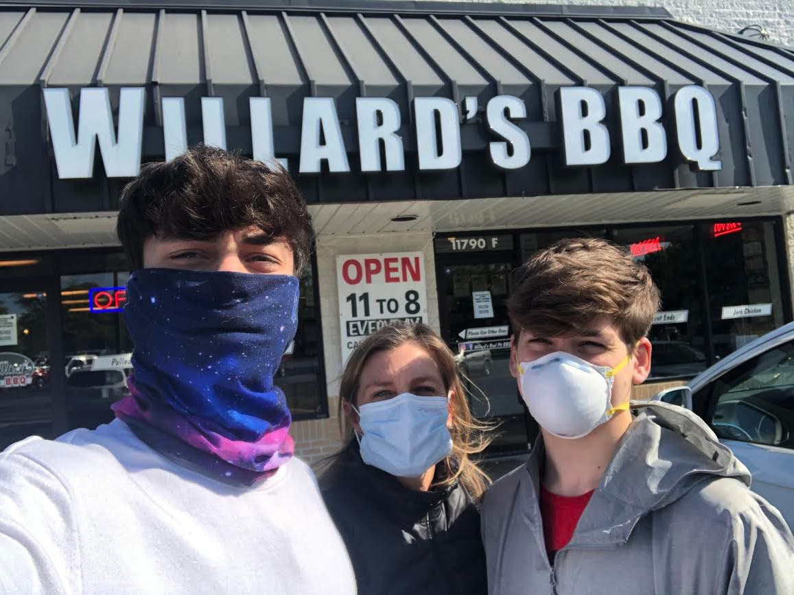 Herndon Cares volunteers pick up dinners at Willard's Real Pit BBQ, a Reston favorite.