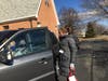 Erika checks in with one of hundreds of dedicated drivers who collect food throughout Northern Virginia.  She and additional Driver Coordinators make sure volunteers picking up food have everything they need to have a successful morning.  