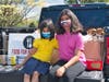 Sarah-Noor Jamani, pictured with her little sister and big helper, Sabrina, delivers a carload and truckload of food to Food For Neighbors, the nonprofit that battles teen food insecurity in Northern Virginia.  www.FoodForNeighbors.org.
