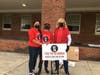 Early Saturday morning, Donna Wilson, the Herndon Area Event Coordinator, joined dedicated volunteers in setting up to receive thousands of pounds of food.