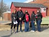 Pictured with FFN Cofounder Karen Joseph (far left) are Luther Jackson Middle School staff including, left to right, Principal Mike Magliola, Social Worker Lisa Hershaft, Special Education Teacher Voula Smith, and ESOL Teacher Kate Lauderdale.