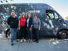 Amazon Fresh district manager, Jim Gillespie (far left), joins Food For Neighbors (FFN) representatives (left to right) Christy McIntyre, Karen Joseph, and Anne O’Flaherty in bringing lots of Amazon Fresh donations into a new school pantry. 