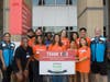 At the Arlington Career Center, Amazon volunteers celebrate helping to sort and and deliver over 1,900 pounds of food and toiletries donated by nearly 150 Arlington area households. These donations will help students in five local secondary schools.