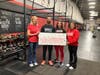 CrossFit Reston, also owned by Samrina Islam, joins Food For Neighbors (FFN) in tackling teen food insecurity. Pictured R-L are Samrina Islam, daughter Jennah Whitehill, and brother Shakil Islam with FFN Founder Karen Joseph.
