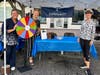 Spin the wheel for prizes at LWRCF's tent