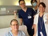 Derek Smith with medical staff at a Tokyo hospital where he is recovering from a severe heart attack while traveling.
