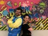 Rabbi Nathan Roller and Rabbi Jaymee Alpert get into the 80's Theme