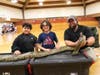 An 80-pound green anaconda, Nebula, was a big attraction with the students