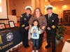From left to right: Joliet Fire Department Deputy Chief John Stachelski, Joliet Public Schools District 86 Superintendent Dr. Theresa Rouse, Joliet Fire Chief Jeff Carey and Carl Sandburg 1st grade winner Alexis Rensendes.