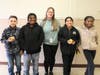 (from left to right) Fifth graders Daniel Sandoval, Juan Moffet, Monserrat Avalos-Ayala, and Naomi Awinongya celebrate with teacher Chelsea Young
