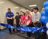 Hufford Junior High School Principal Kyle Sartain officially opens the new Hufford school as students, Superintendent Dr. Theresa Rouse, Board of School Inspectors, and Mayor Terry D'Arcy look on. 
