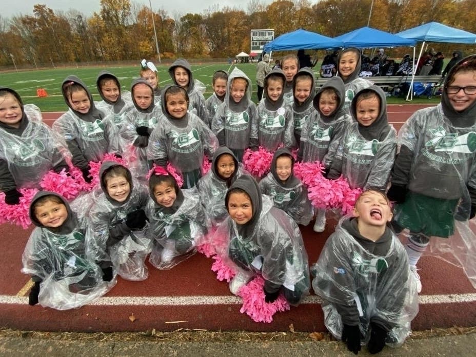 https://patch.com/img/cdn20/users/1713316/20191111/110705/styles/patch_image/public/guilford-youth-cheer-pink-in-the-rain___11110620861.jpg