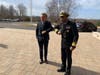 Gov. Ned Lamont and U.S. Surgeon General Jerome Adam​s bump elbows as a way to encourage people to not shake hands to avoid the spread of new coronavirus 