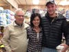 Lenny Caron, daughter Linda Caron Birbarie and her son Austin. Three generations of the family in the near half-century-old Mom & Pop grocery store. 