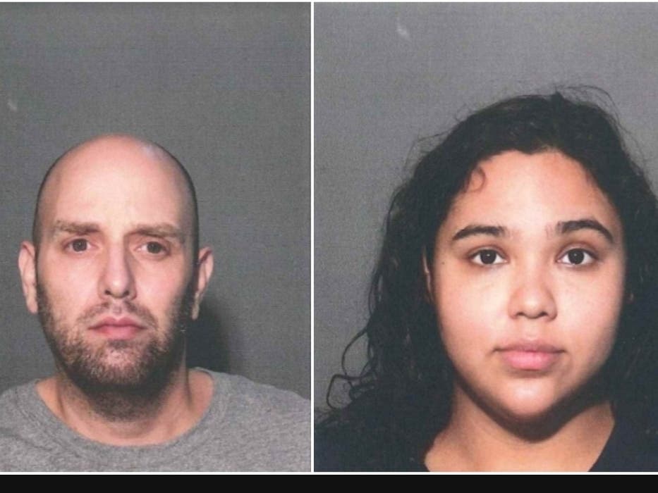 Booking photos of Philip Sarner and Emily Orbay, charged with assault and hate crimes in connection with assault on Black Mystic motel clerk. 