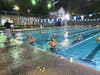 Members of the Hand Girls Swim Team socially distance at the Madison Swim and Racquet Club's outdoor facility. 