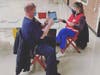 Part of the East Shore District COVID-19 vaccine program, East Haven firefighters get vaccinated at Branford High School.