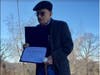 Anthony Marino displays proclamation from US Sen. Richard Blumenthal 