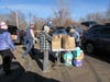 During CT Shoreline Indivisible's National Day of Service Monday, in honor of Martin Luther King Day, a regional drive food, diaper and sanitary supply drive, donors dropped off supplies in the Guilford commuter parking lot Monday.