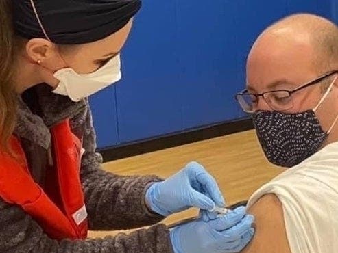 Guilford firefighter Joe Deko received the COVID-19 vaccine earlier this month. 