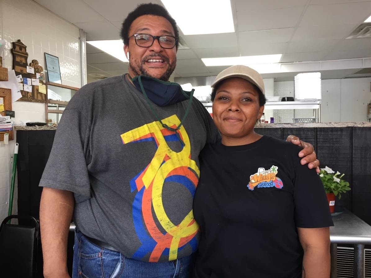 James Green and his daughter Brittany in June 2020 at his then-new eatery Papa's Wings & Seafood. 