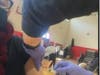 A reporter gets vaccinated Wednesday at the Fair Haven Community Health mass COVID-19 vaccine clinic in New Haven.