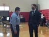 Fair Haven Community Health Vice President of Clinical Affairs Dr. Everett Lamm speaks with New Haven Mayor Justin Elicker at the mass vaccination clinic Wednesday.